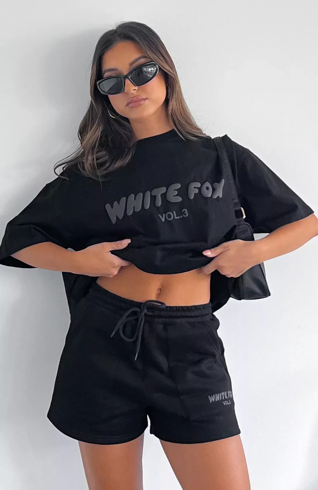 white fox black top